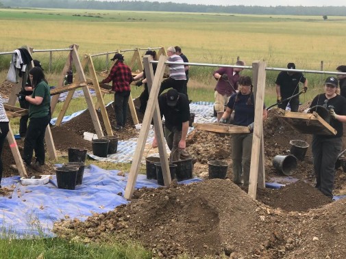 Archaeologists excavate the site where an WWII bomber crashed in 1944